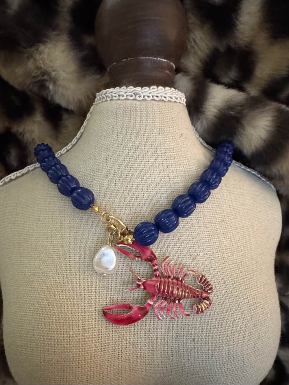 Navy Beaded Necklace with Pink Lobster Pendant and Pearl Charm